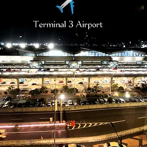 The Palm Tree Condotel Airport Apartment
